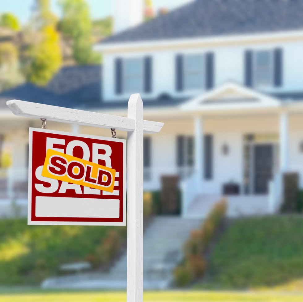sold-home-for-sale-sign-in-front-of-new-house-royalty-free-image-1729697045